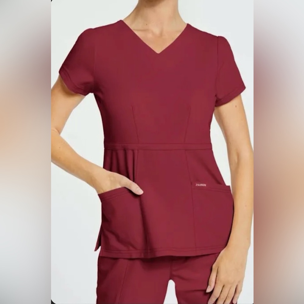 Jaanuu Small gently used maroon peplum scrub top